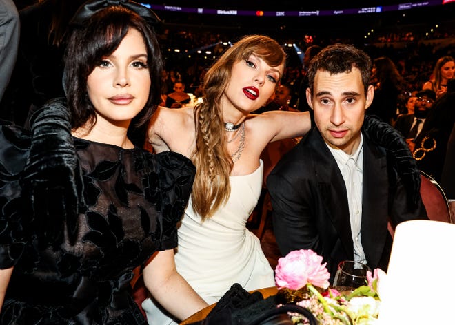 Lana Del Rey, Taylor Swift and Jack Antonoff are seated together during the 66th annual Grammy Awards on Feb. 4, 2024, in Los Angeles.