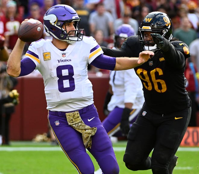 Nov. 6, 2022: Minnesota Vikings quarterback Kirk Cousins is pressured by Washington Commanders defensive end James Smith-Williams (96) during the second half at FedExField.