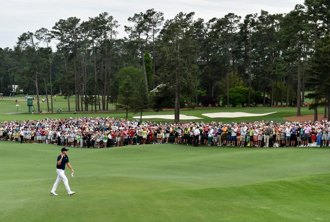 Jordan Spieth walks up No. 18 during the final round of the Masters Tournament at Augusta National Golf Club, Sunday, April 12, 2015, in Augusta, Georgia.