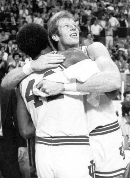 Kent Benson and Scott May hug after Indiana defeated UCLA, 84-64, in the first game of the season. Larry Crewell | Herald-Times