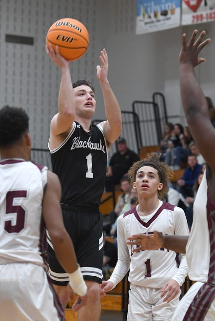 North Buncombe's JT Laws goes up for a shot against Owen during their game at Owen High School on Jan. 2, 2020.