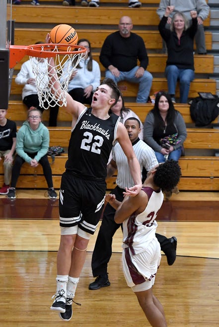 North Buncombe's Caleb Lominac makes a shot against Owen during their game at Owen High School on Jan. 2, 2020.