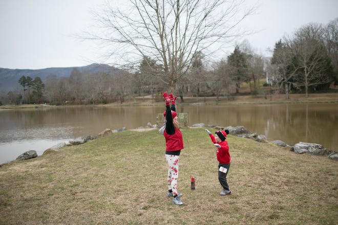 Ashley Winters warmed up with her son Leo; age 6, prior to the Kids Fun Run which preceded the Valentine 5K at Lake Tomahawk in Black Mountain on February 8th, 2020.  
-Colby Rabon (colbyrabon@gmail.com)