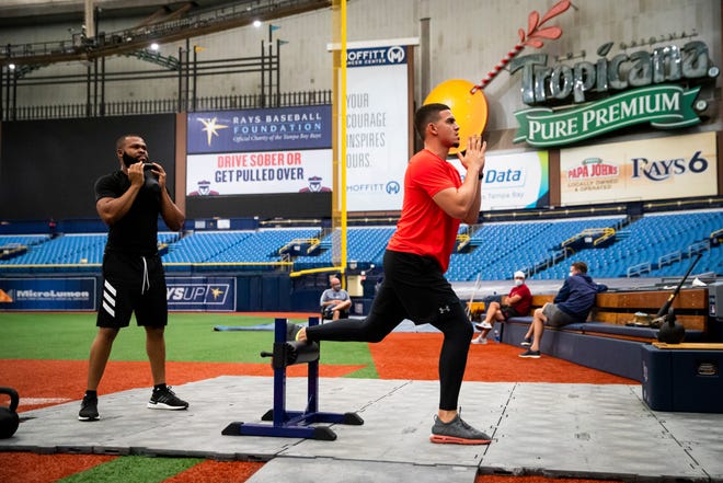 May 25: The Tampa Bay Ray's Manuel Margot, left, and Willy Adames workout at Tropicana Field in St. Petersburg, Florida.