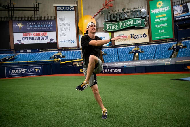 May 25: The Tampa Bay Rays' Ryan Yarbroughwarms up during a voluntary workout at Tropicana Field in St. Petersburg, Florida.