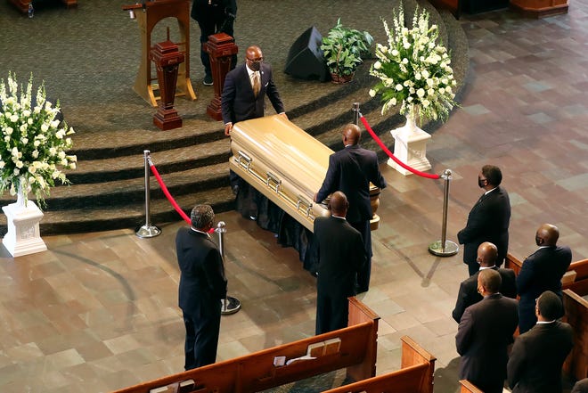 The body of Rayshard Brooks arrives for his funeral at Ebenezer Baptist Church.