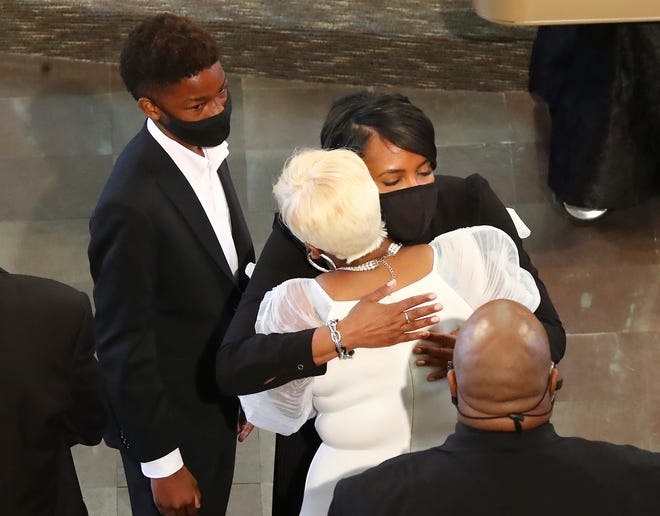 Atlanta Mayor Keisha Lance Bottoms, right, consoles Tomika Miller, the wife of Rayshard Brooks, at the conclusion of his funeral.