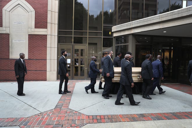 Pallbearers bring the remains of Rayshard Brooks to the Ebenezer Baptist Church for his funeral on June 23, 2020 in Atlanta, Georgia. Brooks was killed June 12 by an Atlanta police officer after a struggle during a field sobriety test in a Wendy's restaurant parking lot.