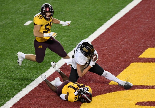 Purdue's Payne Durham scores a fourth-quarter touchdown against Minnesota, but it was called back for offensive pass interference.